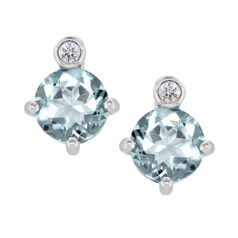 gemstone stud earrings for women -STERLING SILVER STUDS WITH PALE BLUE TOPAZ AND LAB GROWN DIAMOND ACCENTS, .02 CT TW