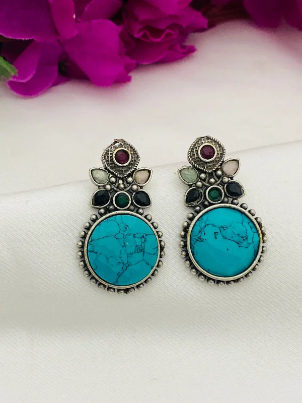 silver hoop earrings for women -Stunning Turquoise Blue Stone Studded Leaf Designed Round Shaped Silver Toned Oxidized Stud Earrings