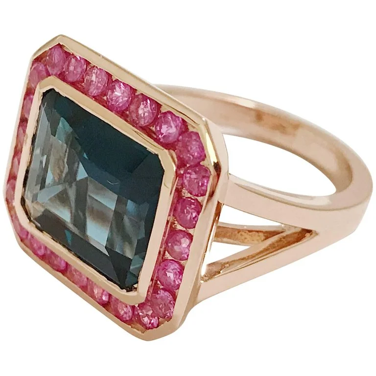 vintage-inspired rings for women -Rose Gold Bezel Set Dark Blue Topaz with Surrounding Pink Sapphire Ring