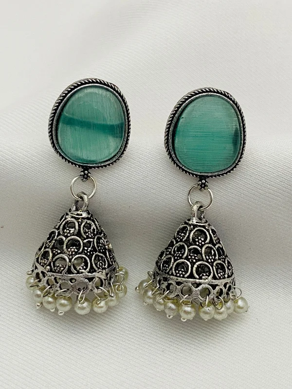 zirconia stud earrings for women -Unique Teal Blue Stone Studded Dome Shaped Silver Plated Oxidized Jhumka Earrings With Pearl Drops