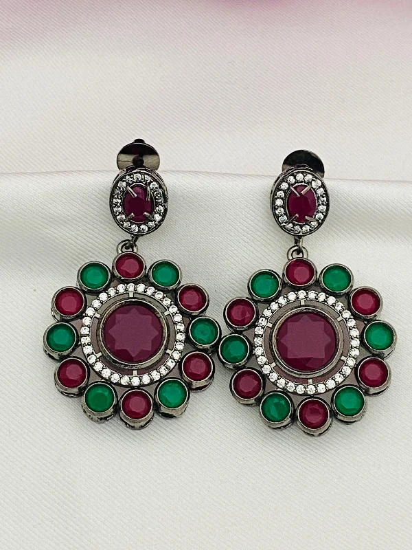 ear jackets for women -Ravishing Emerald And Ruby Stone Studded Floral Design German Silver Plated Dangle Earrings