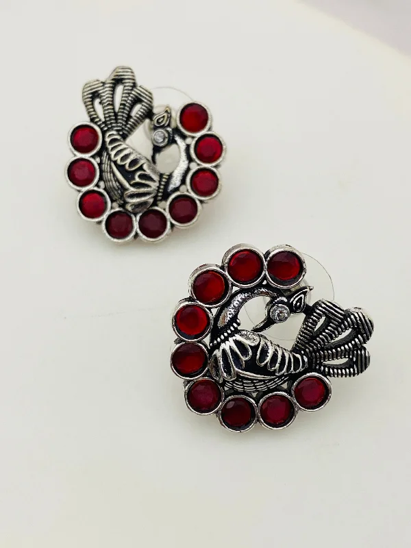 vintage earrings for women -Appealing Red Stone Studded Peacock Designed Silver Toned Oxidized Stud Earrings